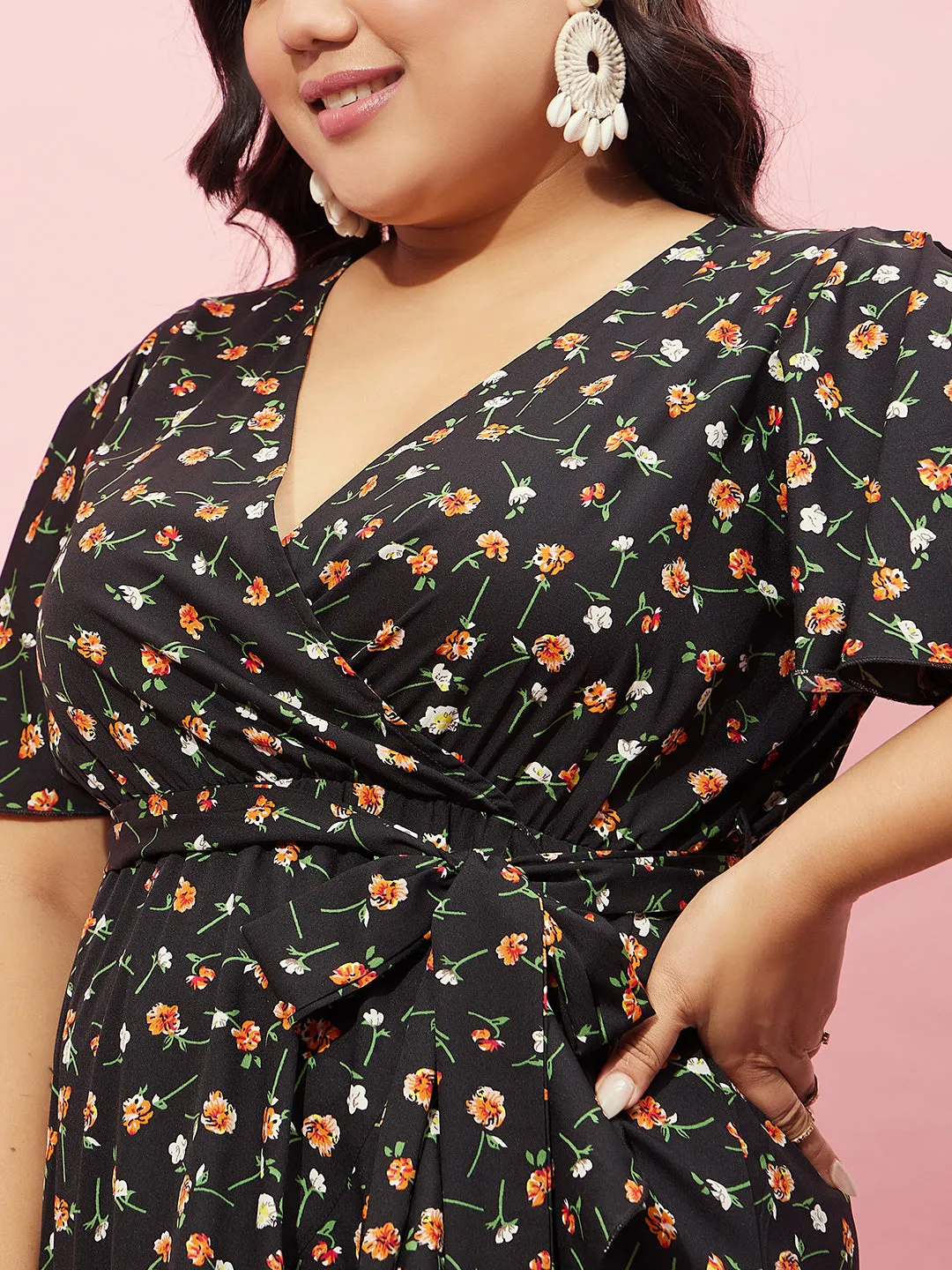 Berrylush Women Plus Size Black & Orange Floral Printed V-Neck Waist Tie-Up Crepe Flounce Hem Wrap Maxi Dress